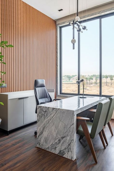 A Mid-Century Modern and Wabi-Sabi Influenced Contemporary office in Erode | Quirk Studio - The Architects Diary Quirk Studio, Office Table Design Modern, Office Counter Design, Architect Office Interior, Office Cabin Design, Modern Office Table, Small Office Design Interior, Contemporary Office Design, Small Office Design