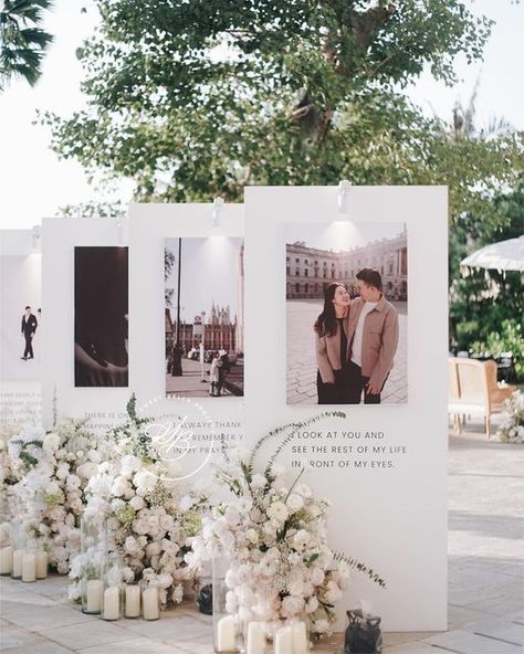 Sweetbella Decoration on Instagram: "I look at you and see the rest of my life in front of my eyes 👀🤍 .. .. Venue @jumeirahbali WO @rivieraeventorganizer Photo @iluminen MC @arnoldwarm @pandasuper .. .. #bali #balievent #baliwedding #baliweddingdestination #baliweddingdecor #baliweddingdecoration #baliweddingstylist #weddingbali #weddinginbali #thebalibride #weddinginspiration #flowers #floristbali #thebridestory #weddingideas #flowerbouquets #cliffweddingbali #dreamwedding #photogallery #welcomesignage" Wedding Decoration Garden, Photo Wedding Decorations, Wedding Signage With Photo, Wedding Decor Photo Display, Wedding Entrance Pictures, Wedding Photo Entrance, Photo Wedding Decor, Wedding Entrance Photo Display, Wedding Venue Entrance Decor