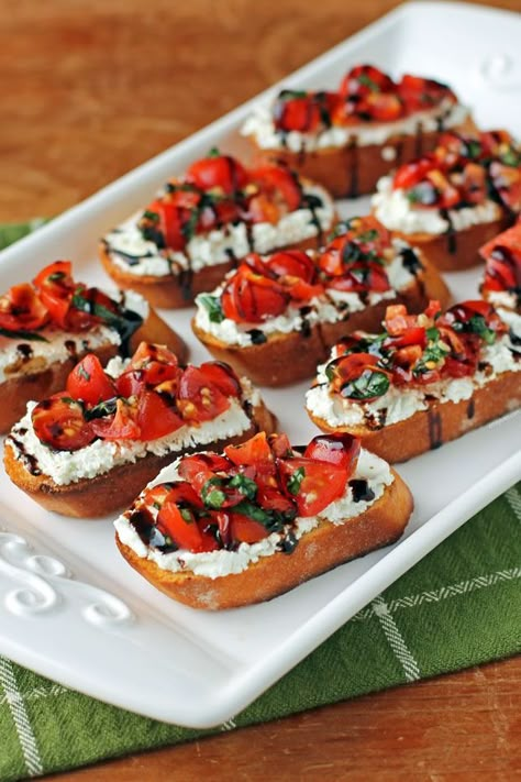 Tomato and Goat Cheese Bruschetta - Emily Bites Birthday Snacks Healthy, Bread With Tomatoes And Cheese, Cheesy Bruschetta Bites, Tiny Bites Appetizers, Small Orderves Party Appetizers, Holiday Party Small Bites, Christmas Bruchetta, Cup Food Ideas Parties, Canapes Aesthetic