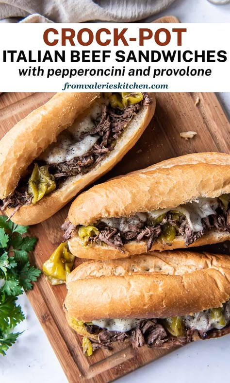 Tender, shredded Italian Beef with pepperoncini loaded on toasty sandwich rolls with melted provolone cheese. With just a few minutes of prep, you can have these comforting Crock-Pot Italian Beef Sandwiches on your menu on even the busiest of days. Italian Beef Sandwiches Crockpot, Beef Pepperoncini, Slow Cooker Italian Beef Sandwiches, Italian Beef Crockpot, Dinner For Guests, Italian Beef Sandwich, Taco Ideas, Beef Sandwich Recipes, Slow Cooker Italian Beef