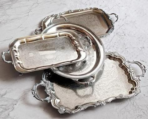 Old, tarnished  beaten or battered ... collect all the vintage silver trays that you can. Serve on them, display on them, put plants or knick-knacks on them. They add charm to any space. Silver Serving Trays, Silver Platters, Butler Tray, Vintage Trays, Silver Trays, Silver Decor, Vintage Silverware, Romantic Decor, Silver Spoons