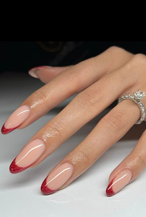 Nail Ideas Christmas French Tip, French Red Nails Christmas, Red Glitter Tips Acrylic Nails, Red Subtle Christmas Nails, Red French Tip Sparkle, French Red Christmas Nails, White With Red Tip Nails, Red Tip Holiday Nails, Red Glitter French Tip Nails Almond