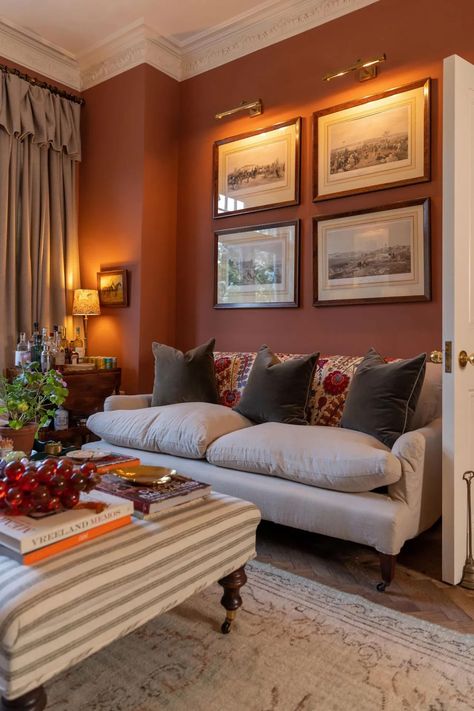 A beautiful sitting room painted in warm terracotta Red Living Room Walls, Terracotta Living Room, Cozy Sitting Room, Snug Room, Luxury Bedroom Design, Living Room Decor Fireplace, Cottage Living Rooms, Living Room Red, Room Paint Colors