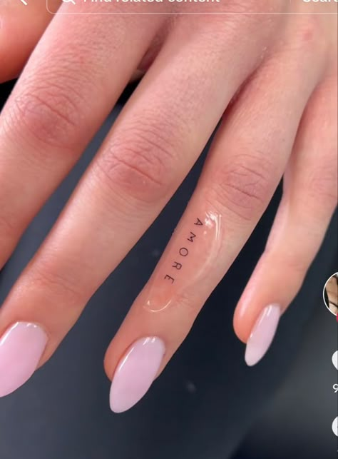 Tiny Tattoos On Finger, Amore Finger Tattoo, A On Finger Tattoo, Amor Finger Tattoo, Small Dainty Finger Tattoos, Finger Tattoos For Women Letters, Tatoos Fingers Ideas, Name Tattoo On Finger For Women, Easy Freehand Tattoos