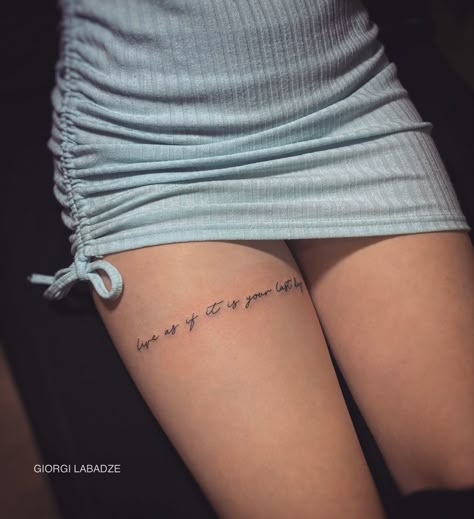 Writing On Leg Tattoo, Thigh Tattoos Women Minimalist, Tattoo On Thigh For Women Quote, Thigh Small Tattoos Women, Quote On Thigh Tattoo, Word Thigh Tattoo Women, Thigh Tattoos Women Meaningful, Leg Tattoo Writing, Back Thigh Tattoos Women Writing