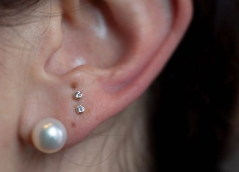 Identity on Instagram: “Thank you to our lovely client for letting us snap a photo of how their stacked earlobe piercings healed! Pierced and captured by…” Stacked Earlobe Piercing, Piercing Chart, Ear Piercings Chart, Ear Piercings, Piercings, Pearl Earrings, Healing, Let It Be, Instagram