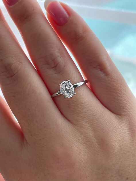 Available with moissanite at this link: https://www.etsy.com/listing/1331516251/ 💎This simplistic but absolutely beautiful engagement ring features 1.5CT oval cut 5A CZ simulated diamond on a minimal 1.8mm sterling silver band. Truly elegant and timeless design. 💎Made of high quality sterling silver and plated with rhodium it will not rust or turn your finger green. Center stone size - 6mm*8mm(1.5Ct) Material: Fine Sterling Silver 925 Plating: Rhodium 💎Will be shipped within 1-2 business days Timeless Engagement Ring White Gold, Simple Wedding Rings Silver Oval, Rings Engagement Silver Simple, Small Round Engagement Ring Silver, Silver Minimalist Engagement Ring, Simple Silver Diamond Engagement Rings, Simplistic Wedding Rings Silver, Silver Band Engagement Ring Simple, Simple Silver Diamond Ring