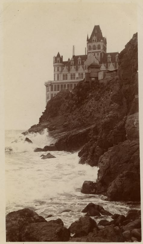 Dennis O'Rorke Collection...The Cliff House on the rocky cliffs above what is now Ocean Beach in San Francisco. Cliff House San Francisco, Cliff House, The Cliff, Legolas, By The Ocean, A Castle, Favorite City, Abandoned Places, Dark Academia