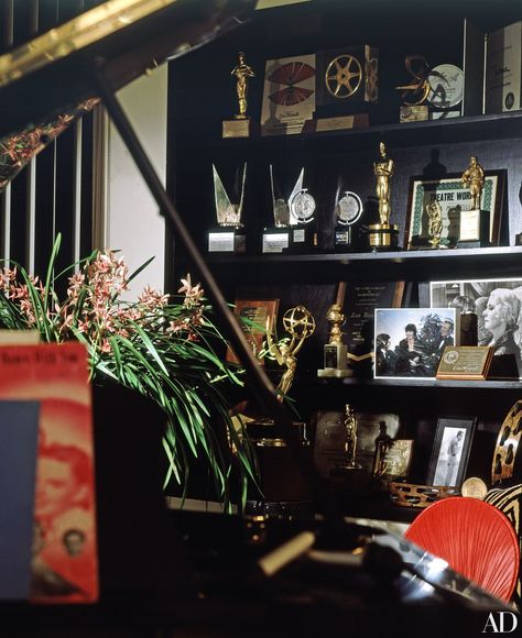 Among Liza Minnelli's awards filling the music room bookcases are an Academy Award for Best Actress in Cabaret, 1972; Tony Awards for Best Actress in The Act and Flora, the Red Menace; an Emmy for the television special Liza with a Z; and various international film honors. Awards Shelf, Award Shelves, Cabaret 1972, New Year Vision Board, New Year Vision, Artist Space, Decor House Ideas, Rep Era, Award Display