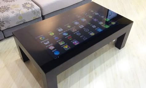 Very nice four leg coffee table with smooth glass top featuring a 42″ HD capacitive touchscreen.  This impressive table compliments most settings and is perfect for banking, hotel lounges, or home use. The surface is a thick waterproof tempered glass with 10 point capacitive touch technology. Touch Screen Table, بيوت ملكية, Smart Table, Room Dressing, Camper Hacks, Hotel Lobbies, Diy Tech, Touch Table, Pi Projects