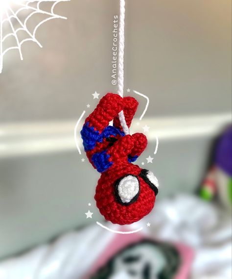 Crochet spiderman. Hanging upside down from a crochet spiderweb. Crochet Ideas Small Yarn, Crochet Spider Man Amigurumi, Crochet Flowers Spiderman, Spider Man Crochet Projects, Spider Man Crochet For Car, Mini Crochet Spiderman, Crochet Hanging Spiderman Pattern, Hanging Spider-man Crochet, Spiderman Sewing Pattern