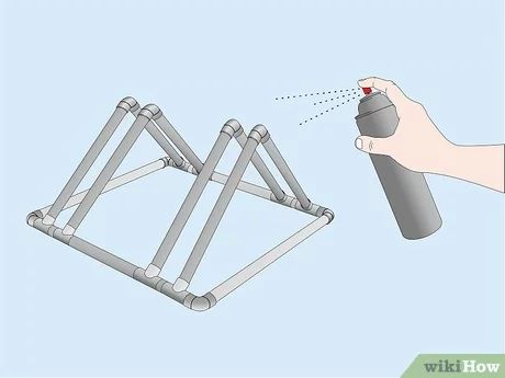 How to Build a PVC Bike Rack: 12 Steps (with Pictures) - wikiHow Pvc Bike Racks, Tool Shed Organizing, Truck Bed Bike Rack, Bike Basket Liner, Old Baby Cribs, Garage Steps, Camping Gear Storage, Diy Bike Rack, Diy Storage Bed