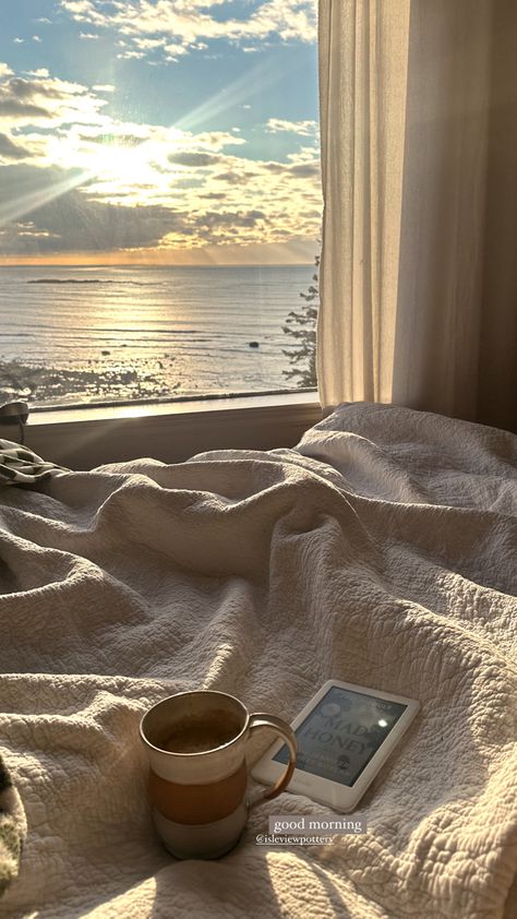 Ocean view from white quilted bed and coffee and kindle sunrise Coffee And Journaling, Kindle And Coffee Aesthetic, Early Morning Astethic, Reading With A View, Morning Coffee Outside, Coffee Outside Aesthetic, Early Morning Coffee Aesthetic, Slowing Down Aesthetic, Coffee Vision Board