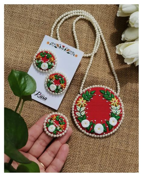 The OG set!! ❤️ Nothing dims the brilliance of a red and white combination— pure simplicity and elegance shining through in every detail. Customisable in any color. DM for details! . . . . . . . . . . . . [New launch, jewelry collection, handmade jewelry, statement jewelry, handmade neckpiece, hand embroidery, necklace, embroidery design, jewelry lover, unconventional jewelry, designer jewellery, fabric jewellery, textile jewelry, embroidery jewelry, embroidery jewelry set, necklace, necklace... Embroidery Jewellery Handmade, Cloth Jewellery Handmade, Embroidery On Red Fabric, Fabric Jewellery Handmade, Fabric Jewelry Handmade, Unconventional Jewelry, Hand Embroidery Jewelry, Handmade Fabric Jewellery, Jewellery Minimal