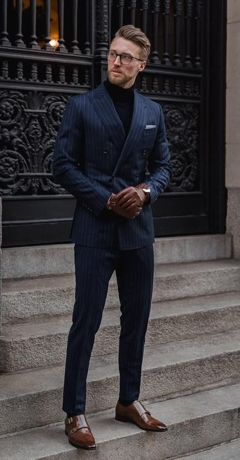 Striped Blue Suit with Black Turtleneck and Monk straps shoes Blue Suit Designs For Men, Suit With Straps Men, Navy Blue Men Suit Outfit, Blue Suit With Turtleneck Men, Navy Blue Wedding Outfit Men, Black Suit Black Turtleneck Men, Navy Blue Suit Styles For Men, New Suits For Men, Classic Suits Men