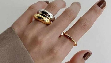 10 Tips on How to Wear Silver and Gold Rings Together - TTT Jewelry Mixed Metals Rings On Hand, Wearing Multiple Rings, Silver Vs Gold Jewelry, How To Wear Multiple Rings, Silver And Gold Rings Together, Silver And Gold Rings, Delicate Gold Bracelet, Gray Ring, Chunky Silver Rings