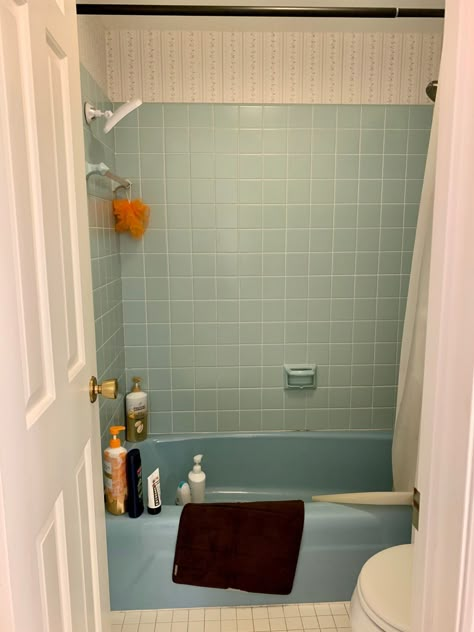 Blue Tile Retro Bathroom, 1970s Blue Tile Bathroom, Over Shower Bath, Updating Vintage Tile Bathrooms, Blue Bathroom Suite Retro, Colored Bathtub Ideas, Bathroom Interior Design Vintage, Two Tone Tiles Bathroom, Blue Bathroom Makeover