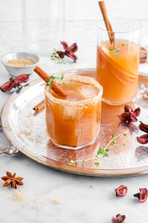 If Fall were a cocktail, it would be this Apple Cider Bourbon Thyme Smash! Every sip is perfectly sweet, full of apple and cinnamon flavor, with just a touch of bourbon. Simply a must-have during the holiday's! Spiked Caramel Apple Cider, Cider Drink Recipes, Spiked Apple Cider Recipe, Caramel Apple Cider Recipe, Slow Cooker Drinks, Cider Cocktail Recipes, Caramel Apple Cider, Apple Cider Drink, Spiked Apple Cider