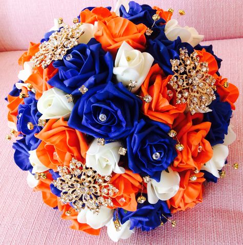 Beautiful posy for a bride wearing full Indian dress in royal blue, orange, gold and ivory Blue And Orange Wedding Dress, Royal Blue Orange Wedding, Orange Blue And White Wedding, Royal Blue And Orange Wedding Theme, Royal Blue And Burnt Orange Wedding, Orange And Royal Blue Wedding, Orange And Blue Wedding Theme, Burnt Orange And Blue Wedding, Royal Blue And Orange Wedding