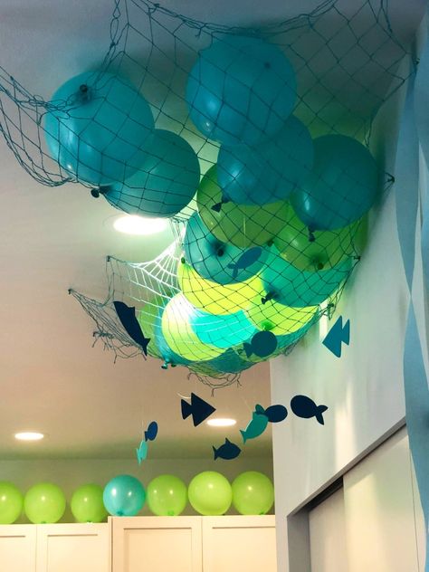 Fish netting
Ocean party
Shark party
Fish decorations
Balloons
Craft fish Ocean Themed Room Decorations, Fish Birthday Party Decorations, Aquatic Decorations Party, Ocean Theme Event, Diy Shark Decorations, Diy Sea Turtle Party Decorations, Under The Sea Party Ideas Decoration, Diy Under The Sea Decorations Ideas, Aquatic Theme Birthday Party