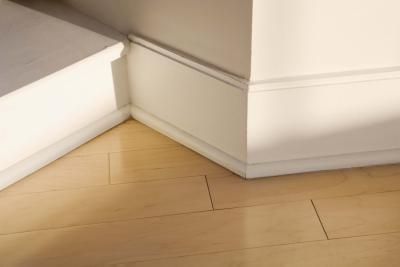 How to Paint Trim With No Brush Marks | eHow Budget Flooring, Basement Remodeling Before And After, Removing Baseboards, Paint Stained Wood, Stained Wood Trim, Baseboard Styles, Cleaning Baseboards, Baseboard Trim, Baseboard Molding