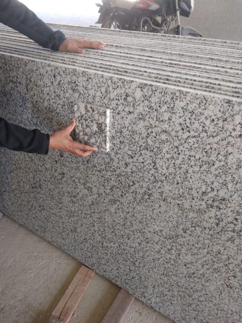 Standard quality P white granite slab is being matched by stone experts at Regatta’s granite factory. This stylish stone has speckles of grey, light green, and black colors on its snow-white surface. #stonematching #granitecolor #naturalstone #quality #slab #construction #india P White Granite Flooring, Kitchen Slabs Granite, Granite Flooring Design In India, Grey Granite Flooring, Granite Flooring Design For Living Room, Kitchen Slab Granite, Granite Flooring Design, Granite For Kitchen, White Granite Slabs