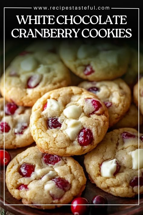 These White Chocolate Cranberry Cookies offer a delightful blend of sweet and tart flavors, combining creamy white chocolate chips with fresh, tangy cranberries. The addition of orange zest and vanilla extract enhances the overall taste, making these cookies a perfect treat for any occasion. Cranberry White Chocolate Chip Cookies, Fresh Cranberry Recipes, Chocolate Cranberry Cookies, Cranberry Cookies Recipes, Chocolate Orange Cookies, Tart Flavors, White Chocolate Cranberry Cookies, Orange Cookies, Christmas Biscuits