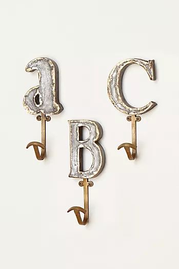 silver initial Anthropologie Wall Decor, Circus Wall Art, Letter Hooks, Monogram Pendant Necklace, Whale Wall Art, Coat Hooks On Wall, Unique Cabinets, Marquee Letters, Nursery Room Decor