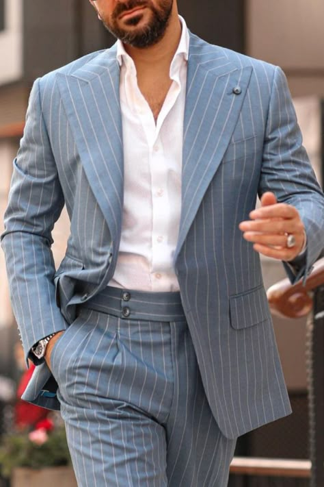 Man wearing a grey pinstripe suit! Modern Pinstripe Suit Men, Informal Suits For Men, Casual Suits Men Modern Man, Sleek Suit Men, Modern Suit Men, Wide Lapel Suit Men, Stripe Suits For Men, Striped Suits Men, Pin Stripe Suit