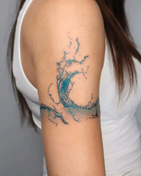 50 Beach Tattoo Ideas: Inspiring Designs for Ocean Lovers Wrist Watercolor Tattoo, Water Themed Tattoos For Women, Water Lover Tattoo, Sea Lover Tattoo, Minimalist Wave Tattoo, Sea Tattoos, Beach Inspired Tattoos, Beach Tattoo Ideas, Wave Tattoo Design