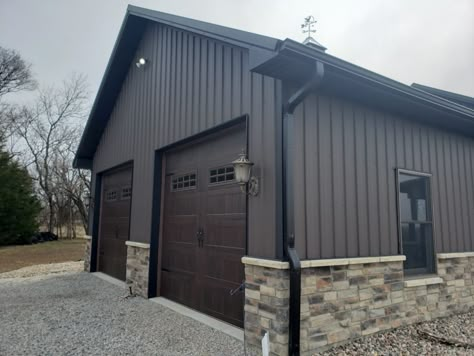 Exterior Garage Ideas, Dark Gray Metal Building, Dark Gray Shop Building, Pole Barn Colors Scheme, Pole Barn Colors, Barndo Shop, Black Pole Barns, Metal Pole Barn Garage, Shop Building Ideas