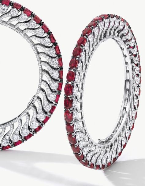 Unique Pair of Ruby and Diamond Bangles, BHAGAT  Each set with thirty-eight oval rubies, to the edge of floral motifs embellished with circular-cut diamonds, the rubies and diamonds weighing approximately 60.00 and 30.00 carats in total respectively, mounted in platinum, one bangle signed BHAGAT, each inner circumference approximately 160mm. Viren Bhagat, Beautiful Bangles, Rubies And Diamonds, Sparkly Bracelets, Diamond Bracelet Design, Diamond Bangles, Ruby Bracelet, Diamond Bangles Bracelet, Beautiful Bracelets