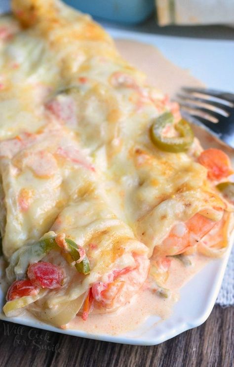 Spicy Creamy Shrimp Enchiladas on a white plate with a fork to the right Creamy Shrimp Enchiladas, Seafood Enchiladas Recipe, Seafood Enchiladas, Shrimp Enchiladas, Best Shrimp Recipes, Creamy Shrimp, Authentic Mexican Recipes, Enchiladas Recipe, Shrimp Recipes For Dinner