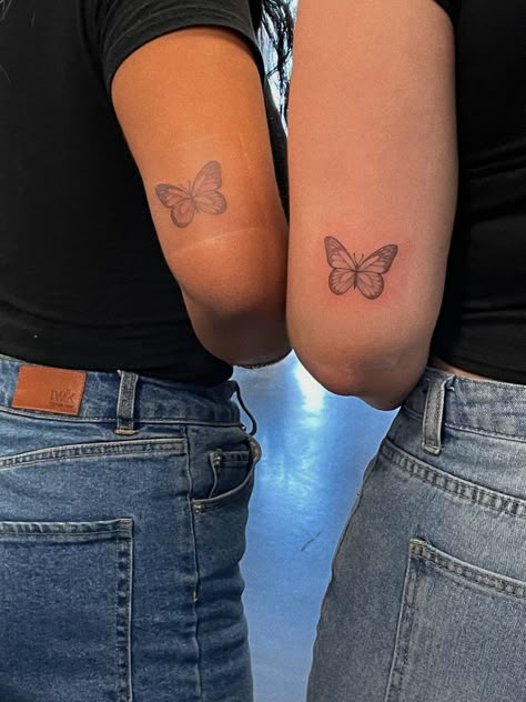 Sister Tattoos For 2 Butterflies, Behind Arm Butterfly Tattoo, Butterfly Tattoo Back Of Leg, Double Tattoo Ideas, Matching Butterfly Tattoos Mom, Matching Butterfly Tattoos Sisters, Butterfly Tattoo Behind Arm, Butterfly Tattoo For Mom, Butterfly Tattoo Above Elbow