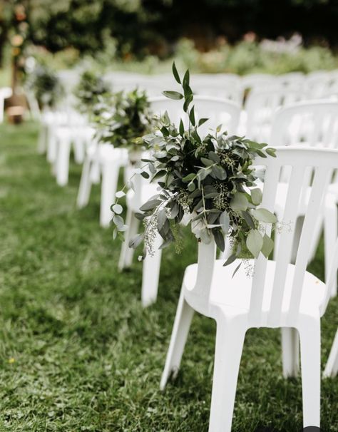 Plastic White Chairs Wedding, Plastic Wedding Chairs, Folding Chair Decorations Wedding Outdoor Ceremony, Plastic Chair Wedding Ceremony, White Wedding Ceremony Chairs, White Chair Decor, Aisle Garden Wedding, Simple Isle Decorations Wedding Outdoor Ceremony, Outdoor Wedding Chairs Ceremony Seating Aisle Decorations