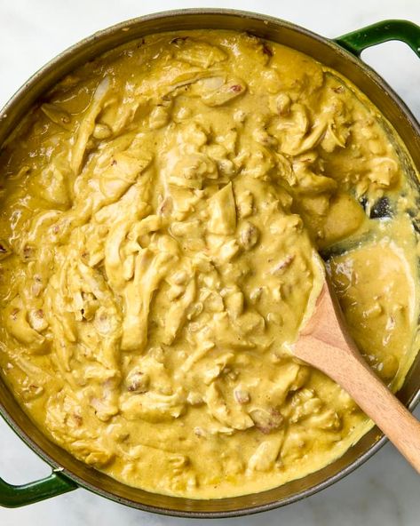 Aji de Gallina Recipe (Peruvian Chicken Chili) | The Kitchn Peruvian Chicken Recipe, Creamy Chicken Chili, Peruvian Chicken, South American Recipes, Poached Chicken, Roasted Pecans, Cooking White Rice, Peruvian Recipes, Pan Meals