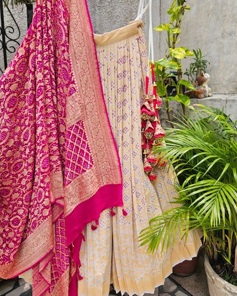 ***SOLD***INR 36500 Pure Banarsi Georgette bandhani lehenga. This three-piece set consists of a stitched lehenga, an unstitched blouse piece, and a beautiful Banarsi georgette bandhani dupatta. Lehenga Length: Approx 43/44 inch length Lehenga Waist: 34-inch waist with drawstrings and zip closure on the side. Lehenga/ Ghagra has a single layer of Cancan and a double layer of lining. Lehenga Fabric: Pure Banarsi Georgette Blouse Fabric: Pure Banarsi Georgette Dupatta Fabric: Pure Banarsi Geor... Bandhani Dupatta Lehenga, Side Lehenga, Lehenga Simple, Bandhani Lehenga, Bandhani Dupatta, Lehenga Fabric, Stitched Lehenga, Georgette Dupatta, Georgette Blouse