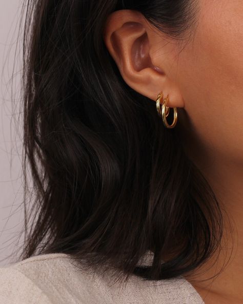 Gold / Silver Stacking Huggie Hoop Earrings  ◇ Hoop measures approx.:  Small - 14mm Large - 18mm  (handmade earrings vary slightly) ◇These earrings are sold as pair. ◇These earrings will arrive in an eco-friendly jewelry paper box, making it a nice gift to give a friend or keep for yourself. ◆ View more EARRINGS https://www.etsy.com/shop/eplusfjewelry?section_id=13190709 ◆ View ALL ITEMS https://www.etsy.com/shop/EFHANDMADEJEWELRY shop policies: https://www.etsy.com/your/shops/EFHANDMADEJEWELRY/ Two Hoop Earrings, Simple Earrings Aesthetic, Two Gold Hoop Earrings, Stud Hoop Earrings, Double Gold Hoop Earrings, Gold Earrings Two Holes, Good Hoops Earrings, Medium Hoop Earrings Gold, Small Gold Hoops Aesthetic