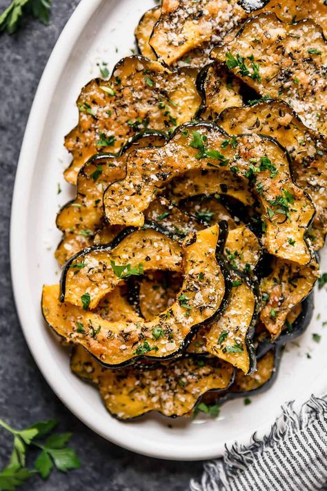 This Roasted Acorn Squash Recipe is unlike any other side dish you'll find. We think it's the best (and easiest) way to prepare acorn squash for your dinner table, holiday menu, and fun foodie gatherings. Made with fresh herbs, Parmesan cheese, and melted butter. Parmesan Roasted Squash, Parmesan Herb Roasted Acorn Squash, Acorn Squash Baked Healthy, Acorn Squash With Stuffing, A Corn Squash, Best Veggie Sides, Parmesan Crusted Acorn Squash, How To Roast Acorn Squash, Thanksgiving Acorn Squash Recipes