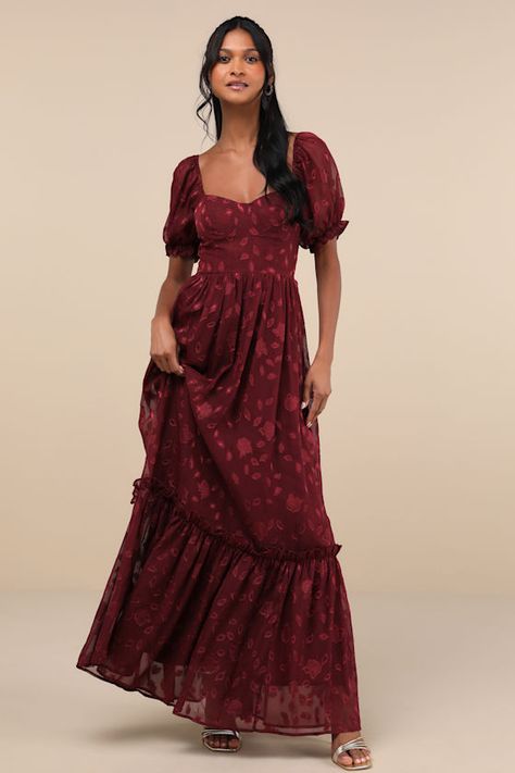 You'll radiate an exceptional essence all night long with the Lulus Phenomenal Sweetness Burgundy Floral Burnout Bustier Maxi Dress! Airy woven chiffon jacquard, with a burnout floral design throughout, shapes this romantic dress that features a bustier-inspired bodice with seamed cups, a sweetheart neckline, and short puff sleeves (with elastic at the shoulders and cuffs). The high, fitted waist tops a flowy, A-line skirt that cascades down to a tiered maxi hem. Hidden back zipper/clasp. Fit: T Boho Burgundy Dress, Big Skirt Dress, Lulus Red Dress, Quinceanera Guest Dress, Red Summer Bridesmaid Dresses, Modest Homecoming Dresses With Sleeves, Boho Chic Wedding Dress Guest, Long Dance Dresses, Maroon Dress Casual