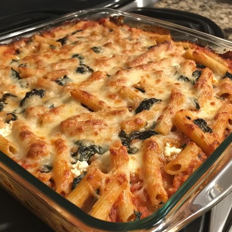 Baked Ziti with Spinach and Ricotta is a classic Italian-inspired pasta bake that’s creamy, cheesy, and loaded with flavor! This hearty dish combines tender pasta, a rich tomato sauce, fresh ... Read more Pasta With Meat Sauce And Ricotta, Baked Pasta Recipes With Ricotta, Baked Ziti With Ricotta And Spinach, Baked Ziti Ricotta Cheese, Pasta Ricotta Recipes, Baked Pasta With Ricotta, Ricotta Spinach Pasta, Baked Ziti With Spinach, Ricotta Pasta Sauce