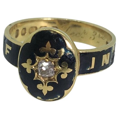 Although Mourning Jewelry has a long & fascinating history, going back to as far as Middle Ages, its popularity reached its peak during the reign of Queen Victoria (1837 - 1901). ~ This extraordinary piece is a Mourning (Memorial) Ring, dating back to Victorian period - circa 1884 yet it's in beautiful condition Of English provenance, it's meticulously crafted in 18K Yellow Gold, decorated in black enamel & adorned with a 0.20ct old-European cut diamond, of cushion shape & good colour & clarity set within the starburst gold frame, surrounded by the most intricate fleur-de-lis pattern, signifying perfection, light and life... ~ The piece is bearing hallmarks: Maker’s mark - T.E. Crown (for gold) 18 (fineness) Leopard’s head (London Assay Office) Letter date - t (c1884) Bearing letters: In M Sunburst Ring, Quiet Beauty, Memorial Ring, Old Rings, Victorian Rings, Custom Ring Designs, Victorian Jewelry, Antique Rings, Black Enamel