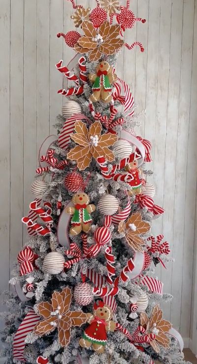 25 Adorable Gingerbread Christmas Decor Ideas - Craftionary Gingerbread Trees Decorated, Gingerbread Christmas Tree Theme Candy Land, Gingerbread House Christmas Tree Ideas, Ginger Bread Themed Christmas Tree, Gingerbread And Peppermint Christmas Tree, Gingerbread Man Christmas Tree Theme, Gingerbread Men Christmas Tree, Gingerbread Themed Christmas Tree Ideas, Ginger Bread Christmas Tree Ideas