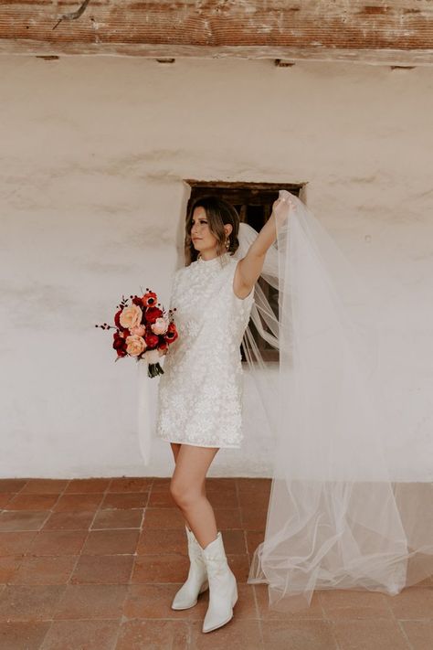 The Bride wearing a short wedding dress and white booties | Image by Maya Lora Wedding Dress With Gogo Boots, Retro Short Wedding Dress, Short Wedding Dress Boots, Short Wedding Dress With Boots, Wedding Dress With Boots, Wedding Dress Boots, Bridal Bouquet Neutral, Bridal Bouquet Unique, Bridal Bouquet Colorful