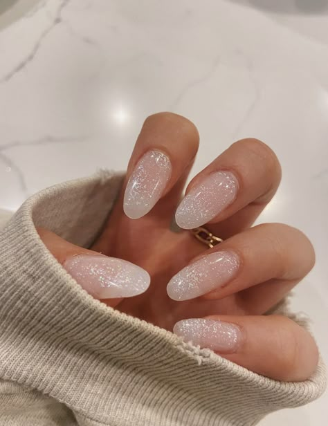 Christmas Nails Simple Almond Shape, White Glitter Nails With Snowflakes, Sparky White Nails, Nail Designs Sparkle Glitter, White Glitter Holiday Nails, Clean Glitter Nails, Christmas And New Years Dip Nails, Winter Nails Glitter White, Minimal New Years Nails