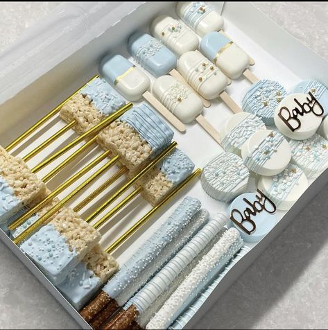 Light Blue Cakesicles, White And Blue Dessert Table, Rice Krispie Treats Baby Shower Blue, Baby Shower Desert Ideas For Boy, Baby Blue Dessert Table, Dusty Blue Desserts, Baby Shower Rice Krispie Treats Boy, Baby Shower Treats Ideas, Baby Shower Boy Dessert Table