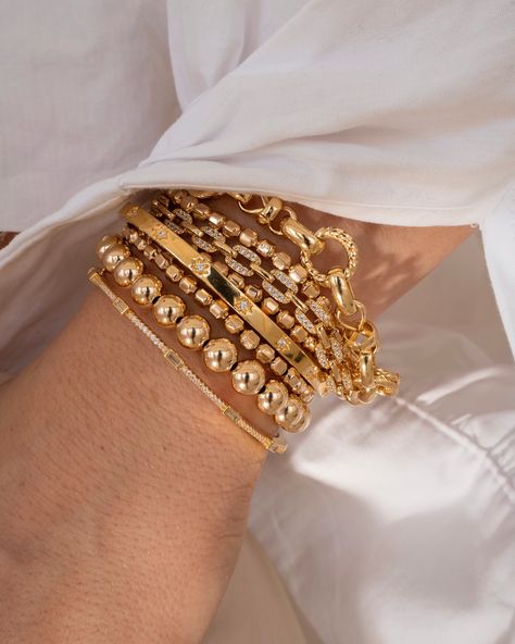 By popular demand, the jumbo version of our popular gold bead bracelets are now available. This statement bracelet looks great on its own, or paired with any of our chains and bead bracelets. 14k gold fill 7 mm Sizing: Made to a standard 6” and can stretch to 6.5” Please measure wrists accordingly Luxury Bracelet Stack, Gold Beaded Bracelets, Chunky Gold Bracelet, Big Bracelets, Artificial Jewelry, Gold Vermeil Jewelry, Gold Girl, Luxury Bracelet, Gold Bead Bracelets