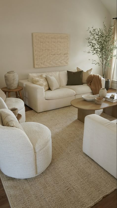 #organiclivingroom #neutralhomeinspo #neutrals #neutralhomedecor #livingroominspo #sofastyling #livingroomrugs #neutralrugs #neutralhomeinspo Living Room Decor Earthy Tones, Boucle Accent Chair Living Room, Organic Modern Living Room Beige Couch, Beige Couch Rug, Living Room Rug Beige Couch, Neutrals And Green Living Room, Organic Modern Minimalist Living Room, Earthy Organic Modern Decor Living Room, Soft Neutral Living Room