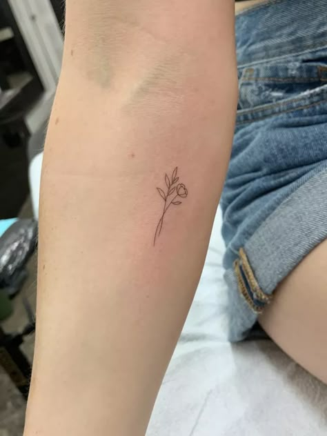 46 Flower Tattoo Ideas For Every Floral Aesthetic Tulips Flowers Tattoo, Dainty Floral Bouquet Tattoo, Small Birth Month Flower Tattoo, November And October Flower Tattoo, Tiny Flower Tattoo Placement, Miniature Tattoos For Women, Tiny Wildflower Tattoo, Wrist Tattoos For Women Flower, Peony Minimalist Tattoo