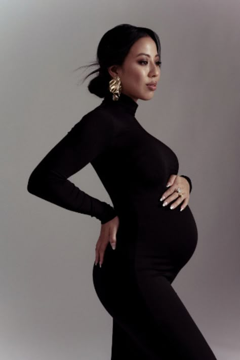 maternity photography in black dress and gold earring Business Maternity Shoot, Kim Kardashian Maternity Shoot, Glam Maternity Shoot Classy, Luxury Maternity Clothes, Maternity Photography Denim, Chic Maternity Photos, Classy Pregnancy Photoshoot, Modest Maternity Photos, Simple Elegant Maternity Shoot